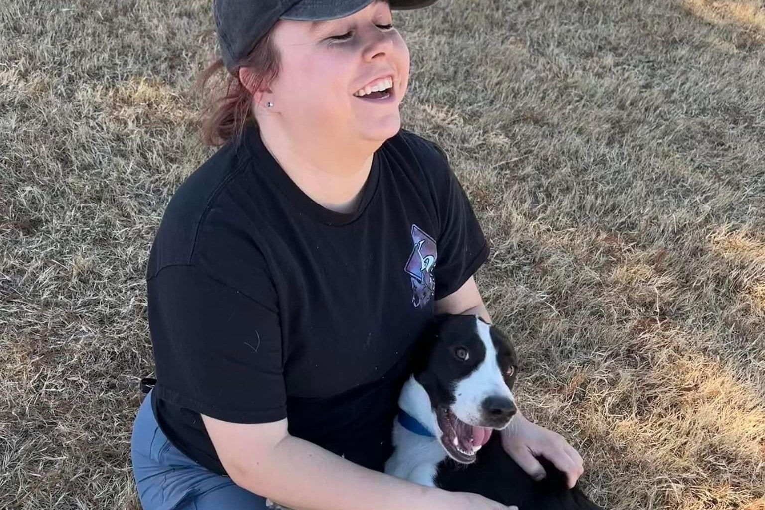 Trainer playing with dog